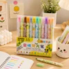12 Colors Fruit Scented Highlighter Set with pastel highlighter pens in a storage box for studying, journaling, note-taking, and office use. 12 Colors Fruit Scented Highlighter Set with pastel highlighter pens in a storage box for studying, journaling, note-taking, and office use.