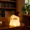 Cute Ghost Night Light with soft warm LED glow and silicone body, perfect for bedroom décor, nursery, bedside table, and cozy room lighting. Cute Ghost Night Light with soft warm LED glow and silicone body, perfect for bedroom décor, nursery, bedside table, and cozy room lighting.