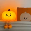 Cute Pumpkin Night Light made from soft silicone with warm LED lighting, perfect for bedrooms, nurseries, Halloween décor, and cozy bedside lighting.
