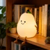 Cute pear silicone LED night light with soft warm glow, adorable character design for kids' bedrooms, nurseries, bedside tables and cozy décor Cute pear silicone LED night light with soft warm glow, adorable character design for kids' bedrooms, nurseries, bedside tables and cozy décor