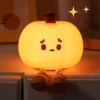 Cute Pumpkin Night Light made from soft silicone with warm LED lighting, perfect for bedrooms, nurseries, Halloween décor, and cozy bedside lighting.