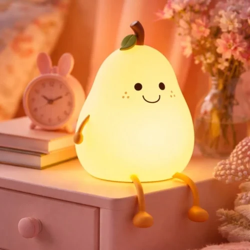Cute pear silicone LED night light with soft warm glow, adorable character design for kids' bedrooms, nurseries, bedside tables and cozy décor Cute pear silicone LED night light with soft warm glow, adorable character design for kids' bedrooms, nurseries, bedside tables and cozy décor