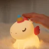 Cute Unicorn Night Light made from soft silicone with a warm LED glow, perfect for kids' bedrooms, nurseries, bedside tables, and kawaii room décor.
