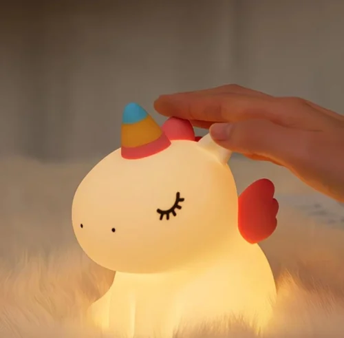 Cute Unicorn Night Light made from soft silicone with a warm LED glow, perfect for kids' bedrooms, nurseries, bedside tables, and kawaii room décor.