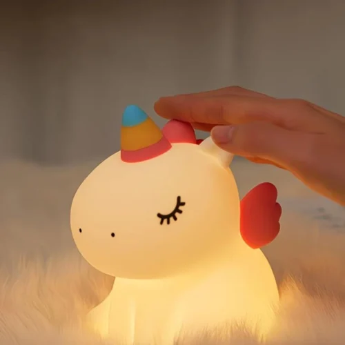 Cute Unicorn Night Light made from soft silicone with a warm LED glow, perfect for kids' bedrooms, nurseries, bedside tables, and kawaii room décor. Cute Unicorn Night Light made from soft silicone with a warm LED glow, perfect for kids' bedrooms, nurseries, bedside tables, and kawaii room décor.