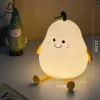 Cute pear silicone LED night light with soft warm glow, adorable character design for kids' bedrooms, nurseries, bedside tables and cozy décor Cute pear silicone LED night light with soft warm glow, adorable character design for kids' bedrooms, nurseries, bedside tables and cozy décor
