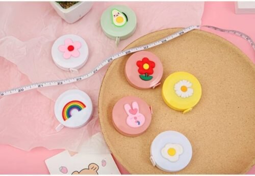 Cute mini retractable tape measures with pastel flower, rainbow, bunny and daisy designs