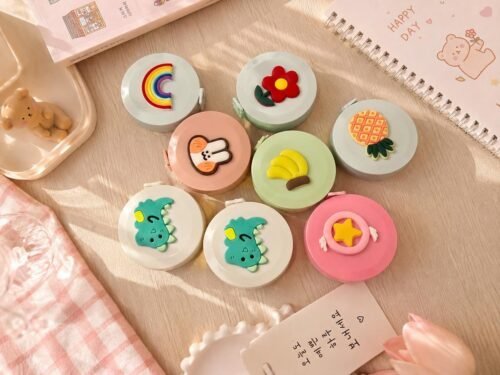 Cute mini retractable tape measures with pastel flower, rainbow, bunny and daisy designs