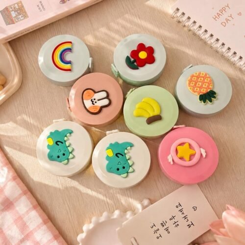 Cute mini retractable tape measures with pastel flower, rainbow, bunny and daisy designs Cute mini retractable tape measures with pastel flower, rainbow, bunny and daisy designs