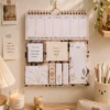Minimalist Marble Weekly Planner Sticky Notes Set with memo pads, page markers, and weekly planner on a wall. Minimalist Marble Weekly Planner Sticky Notes Set with memo pads, page markers, and weekly planner on a wall.