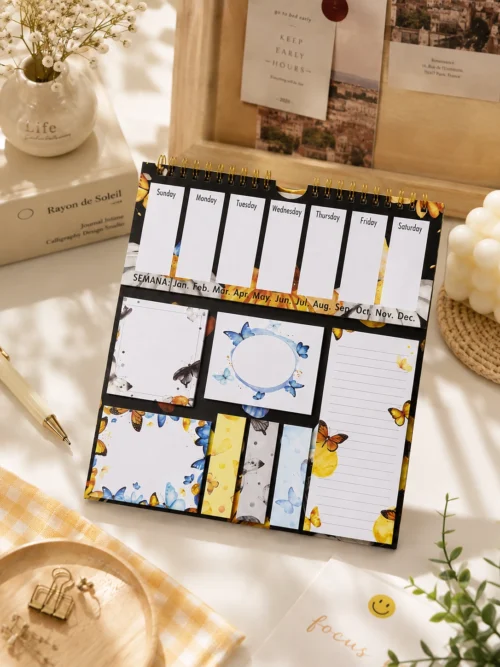 Butterfly Weekly Planner Sticky Notes Set with memo pads, sticky notes, page markers, and lined note pad on a desk.