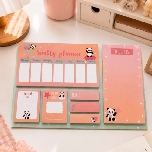 Kawaii Panda Weekly Planner Sticky Notes Set with weekly planner, to-do list, memo pads, sticky notes, and page markers on a wooden desk. Kawaii Panda Weekly Planner Sticky Notes Set with weekly planner, to-do list, memo pads, sticky notes, and page markers on a wooden desk.
