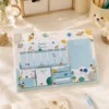 Space Weekly Planner Sticky Notes Set with rockets, planets, weekly planner, memo pads, sticky notes, page markers, and to-do list on a wooden desk.