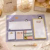 Cute Penguin Sticky Notes Planner Set with weekly planner, to-do list, memo pads, sticky notes, and page markers on a wooden desk.