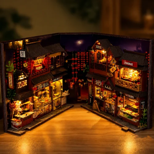 Miniature building block kit featuring a detailed Chinese food street with tiny shops, food stalls, lanterns and street décor