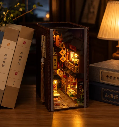 Miniature building block kit featuring a detailed Chinese food street with tiny shops, food stalls, lanterns and street décor