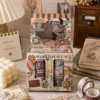 Vintage washi tape set with retro collage designs, floral details, stamps and decorative paper motifs Vintage washi tape set with retro collage designs, floral details, stamps and decorative paper motifs