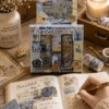 Blue butterfly washi tape set with vintage stamps, postcards, text and butterfly designs Blue butterfly washi tape set with vintage stamps, postcards, text and butterfly designs