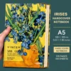 Van Gogh notebook with blue iris floral artwork on a yellow hardcover