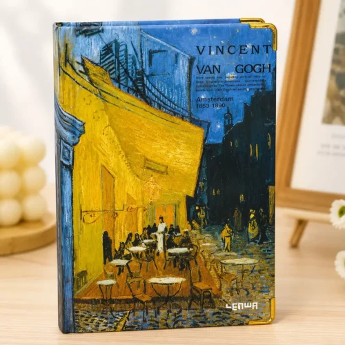 Van Gogh Night Café notebook with blue and yellow café artwork on the hardcover