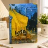 Van Gogh Night Café notebook with blue and yellow café artwork on the hardcover