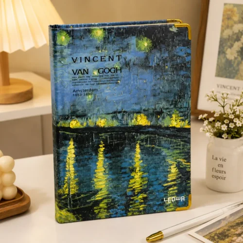 Van Gogh Café Terrace Notebook featuring blue and yellow night café artwork on the cover