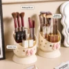 Cute desk organizer with pink bow and star cutouts holding pens and makeup brushes Cute desk organizer with pink bow and star cutouts holding pens and makeup brushes