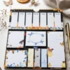 Butterfly Weekly Planner Sticky Notes Set with memo pads, sticky notes, page markers, and lined note pad on a desk.