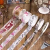 Vintage butterfly washi tape set with pink floral, postcard, stamp and butterfly designs Vintage butterfly washi tape set with pink floral, postcard, stamp and butterfly designs