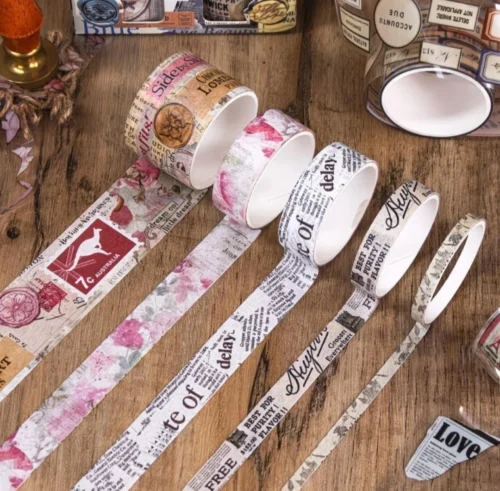 Vintage butterfly washi tape set with pink floral, postcard, stamp and butterfly designs Vintage butterfly washi tape set with pink floral, postcard, stamp and butterfly designs