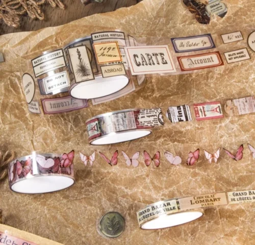 Vintage washi tape set with retro collage designs, floral details, stamps and decorative paper motifs Vintage washi tape set with retro collage designs, floral details, stamps and decorative paper motifs