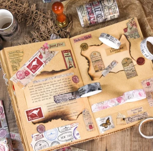 Vintage butterfly washi tape set with pink floral, postcard, stamp and butterfly designs Vintage butterfly washi tape set with pink floral, postcard, stamp and butterfly designs