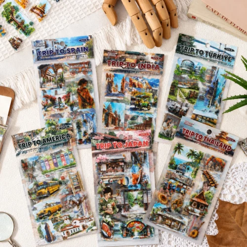 Travel themed sticker sheets featuring colorful destination scenes from countries